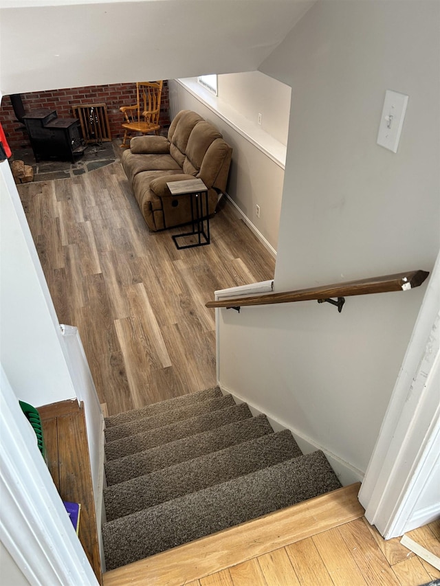 stairway with wood finished floors