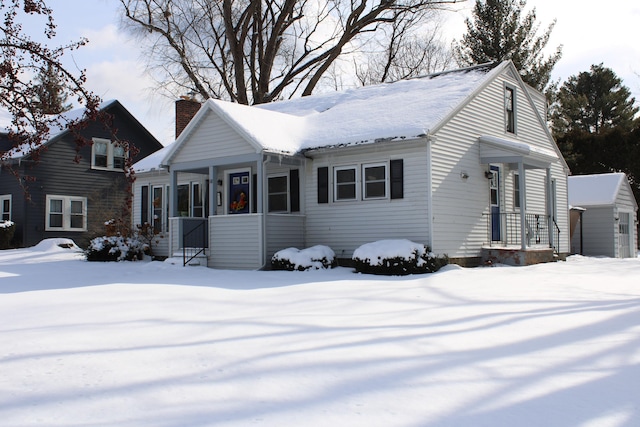 view of front of property featuring a chimney