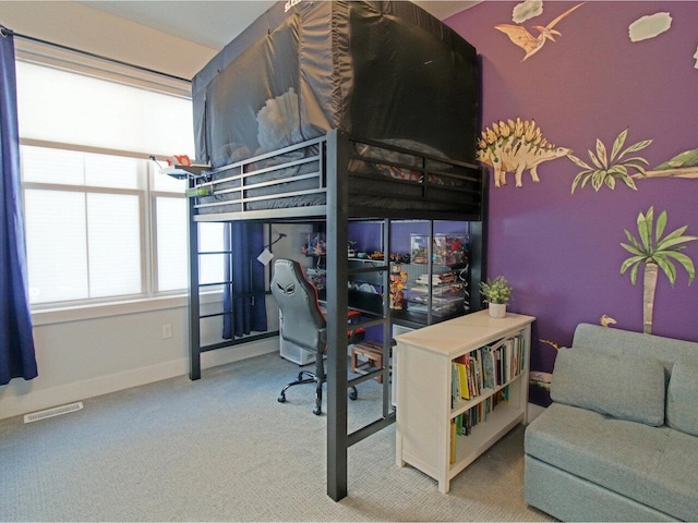 bedroom featuring carpet, visible vents, and baseboards