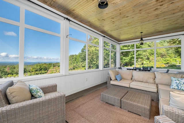 sunroom / solarium with wood ceiling