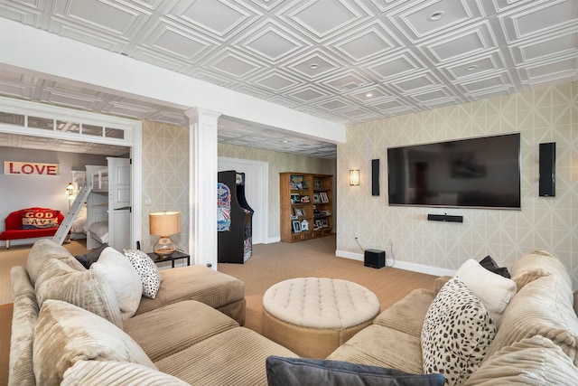 living room featuring an ornate ceiling, light colored carpet, baseboards, ornate columns, and wallpapered walls