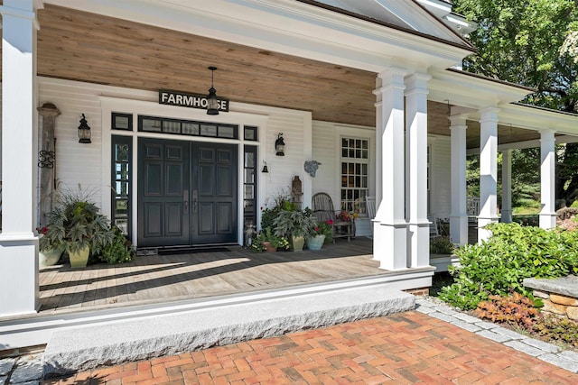 doorway to property with covered porch