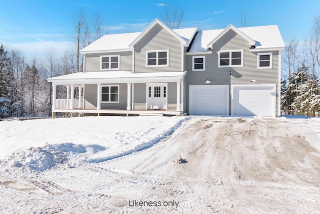 view of front of house with covered porch and a garage