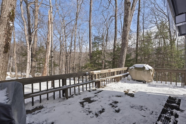 view of snow covered deck