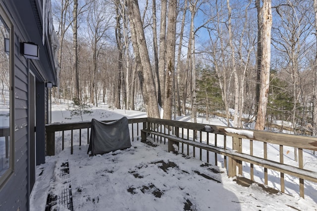 view of snow covered deck