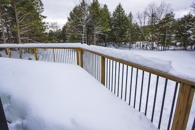 view of snow covered deck