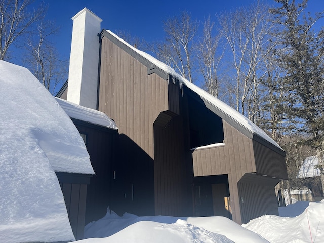 view of snow covered property