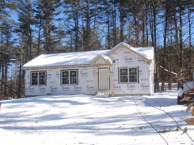 property in mid-construction featuring entry steps