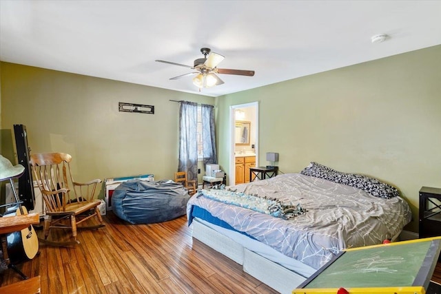 bedroom featuring ceiling fan and wood finished floors