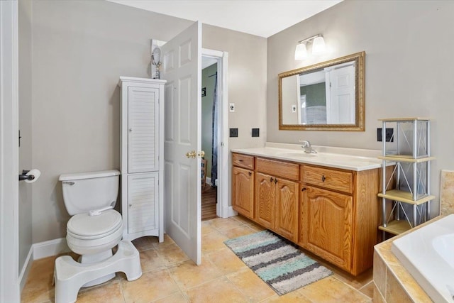 full bathroom featuring toilet, tile patterned flooring, vanity, tiled tub, and a closet