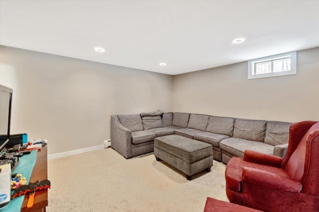 carpeted living room featuring recessed lighting and baseboards