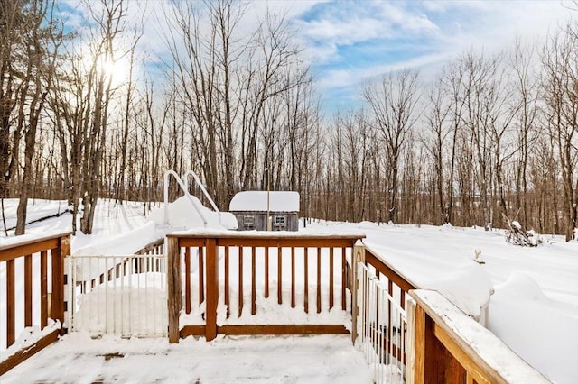 view of snow covered deck