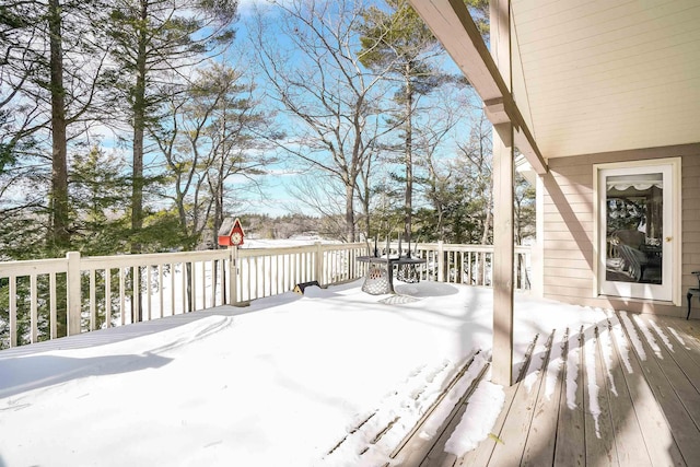 view of snow covered deck