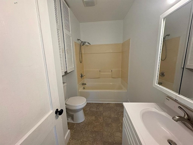 bathroom with visible vents, tub / shower combination, vanity, and toilet