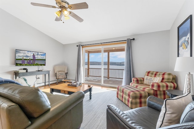 living room with ceiling fan, a baseboard radiator, vaulted ceiling, and wood finished floors