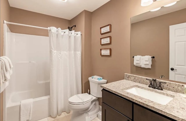 bathroom with toilet, tile patterned floors, shower / bath combination with curtain, and vanity