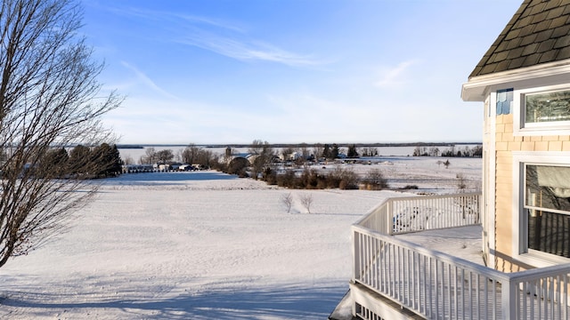 view of yard layered in snow