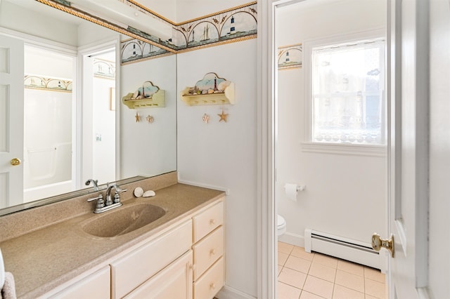 bathroom featuring a baseboard heating unit, toilet, tile patterned flooring, and vanity