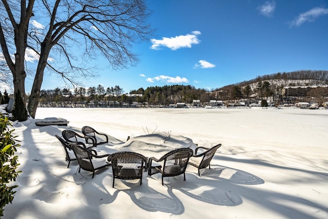 view of snow covered patio