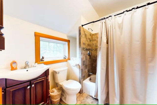 bathroom featuring vanity, toilet, and shower / tub combo with curtain