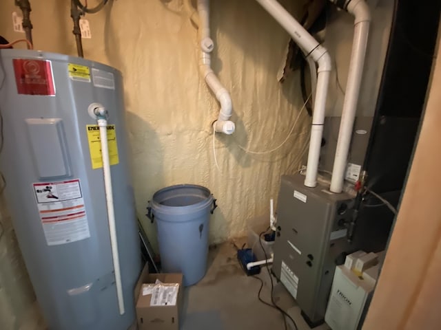 utilities featuring water heater and heating unit