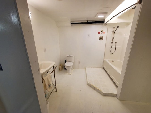 full bathroom featuring tub / shower combination, concrete floors, and toilet