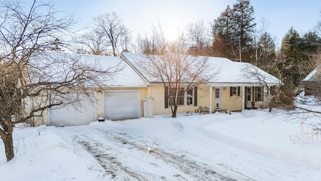 view of front of property with entry steps and an attached garage