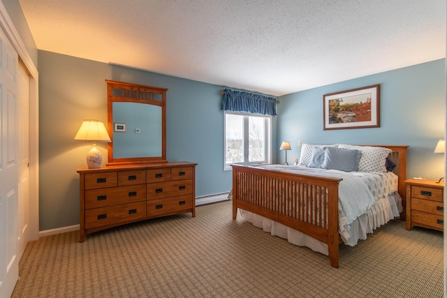 bedroom featuring light carpet, a baseboard radiator, baseboards, and a textured ceiling