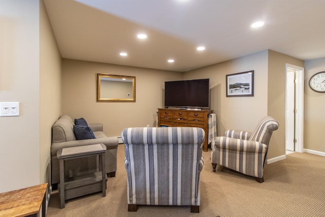 living area with light carpet, baseboards, and recessed lighting