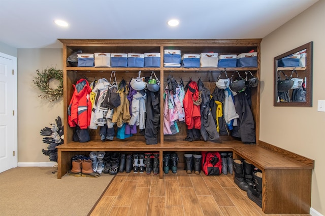 mudroom featuring recessed lighting and baseboards