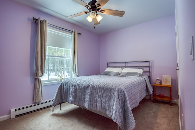 carpeted bedroom featuring baseboards, a baseboard heating unit, and a ceiling fan