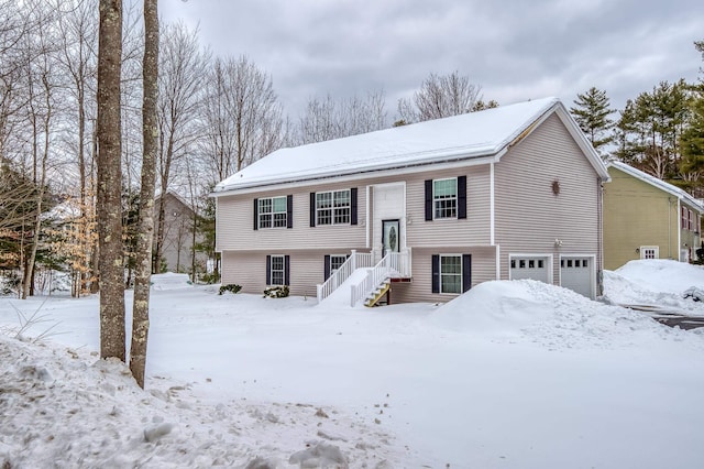 bi-level home featuring a garage