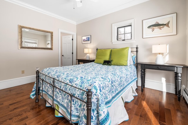 bedroom featuring dark wood finished floors, crown molding, and baseboards