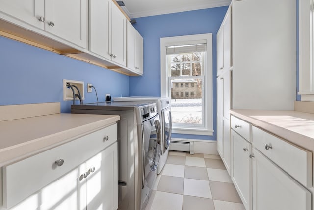 laundry room with ornamental molding, a baseboard radiator, cabinet space, and separate washer and dryer