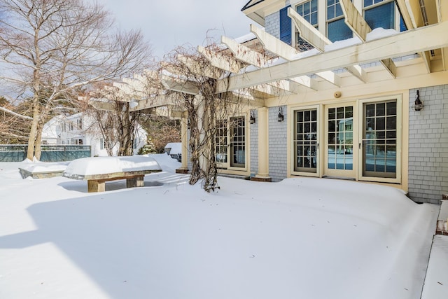 view of snow covered patio