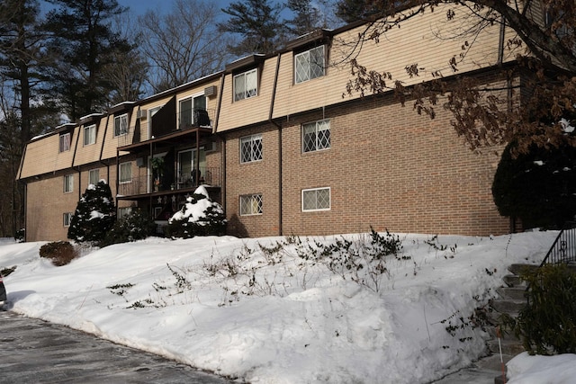 view of snow covered property