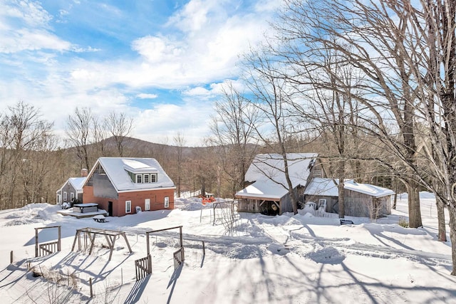 view of yard covered in snow