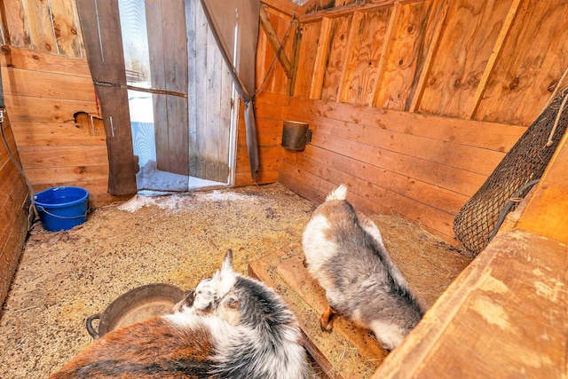 interior space featuring wood walls