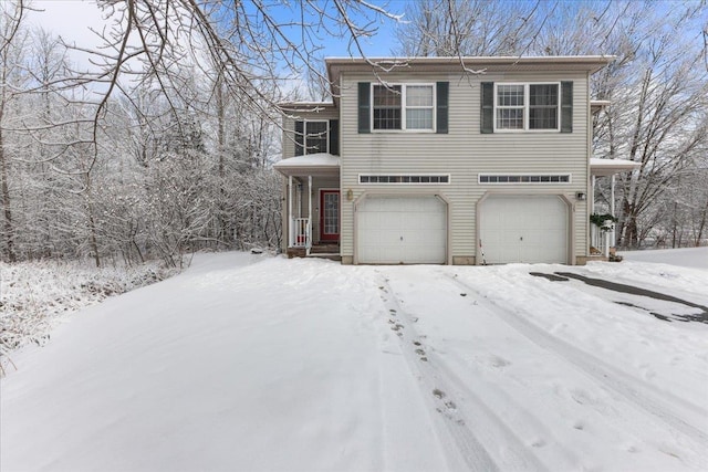 view of front of property with a garage