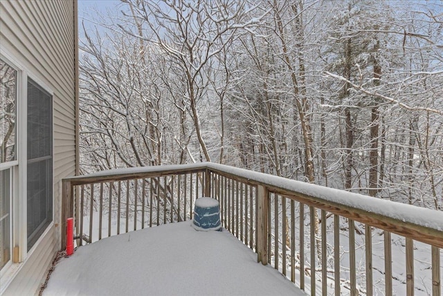 view of snow covered deck