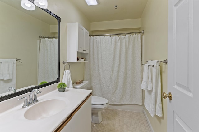 full bath featuring toilet, tile patterned floors, and vanity