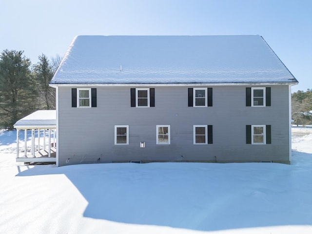 view of snow covered house