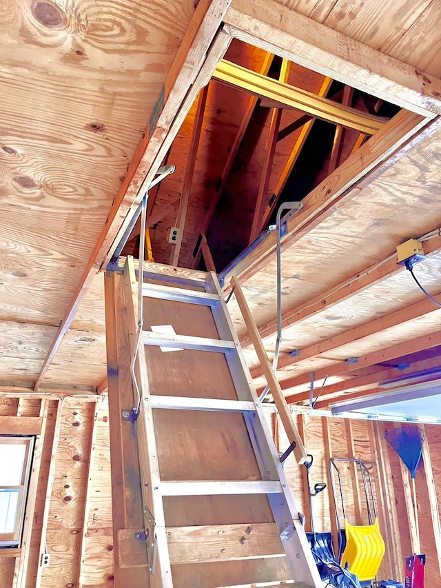 stairs featuring wood ceiling