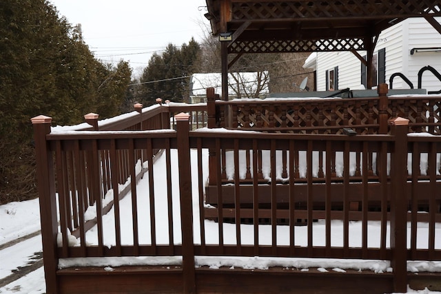 view of snow covered deck