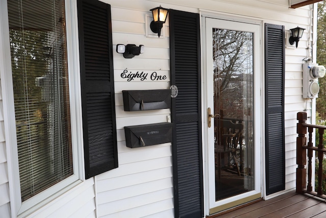 doorway to property featuring a porch