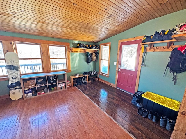 entrance foyer featuring vaulted ceiling, wood finished floors, and wood ceiling