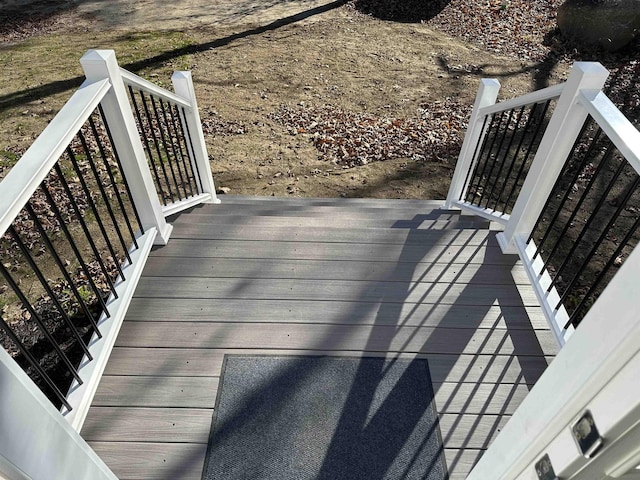 wooden deck featuring stairway