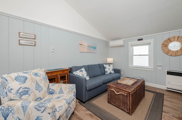 living area with wood finished floors, visible vents, vaulted ceiling, a wall mounted AC, and heating unit