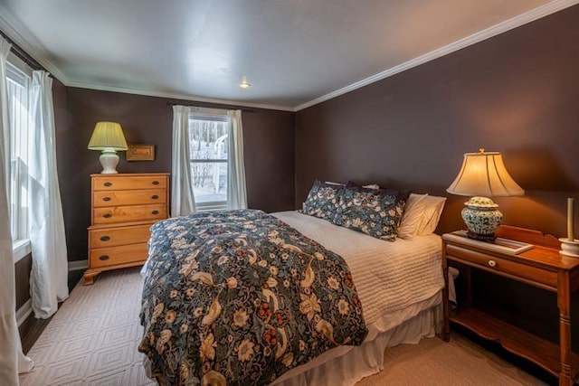 bedroom featuring ornamental molding and baseboards