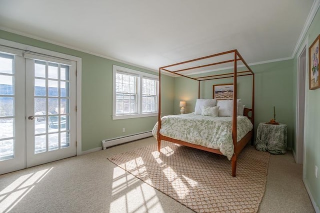 carpeted bedroom with a baseboard heating unit, baseboards, access to outside, french doors, and ornamental molding